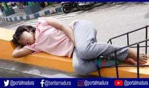 Jadi Pusat Perhatian, Wanita Cantik Tidur di Simpang 4 Traffic Light Jantung Kota Sumenep