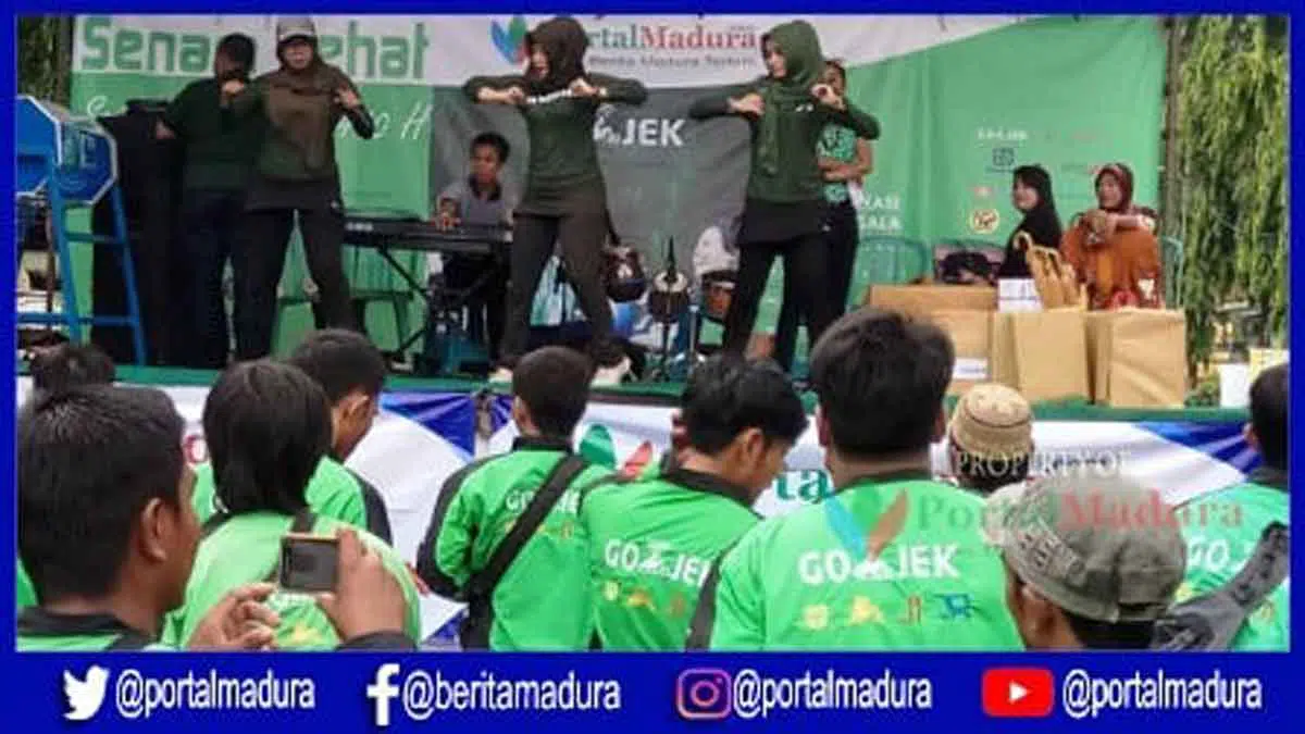 Diguyur Hujan, Senam Sehat Bersama Go-Jek Madura Tetap Meriah - Portalmadura.com Diguyur Hujan, Senam Sehat Bersama Go-Jek Madura Tetap Meriah
