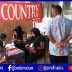 Hujan Deras, Pemungutan Surat Suara di Pamekasan Dihentikan Sementara