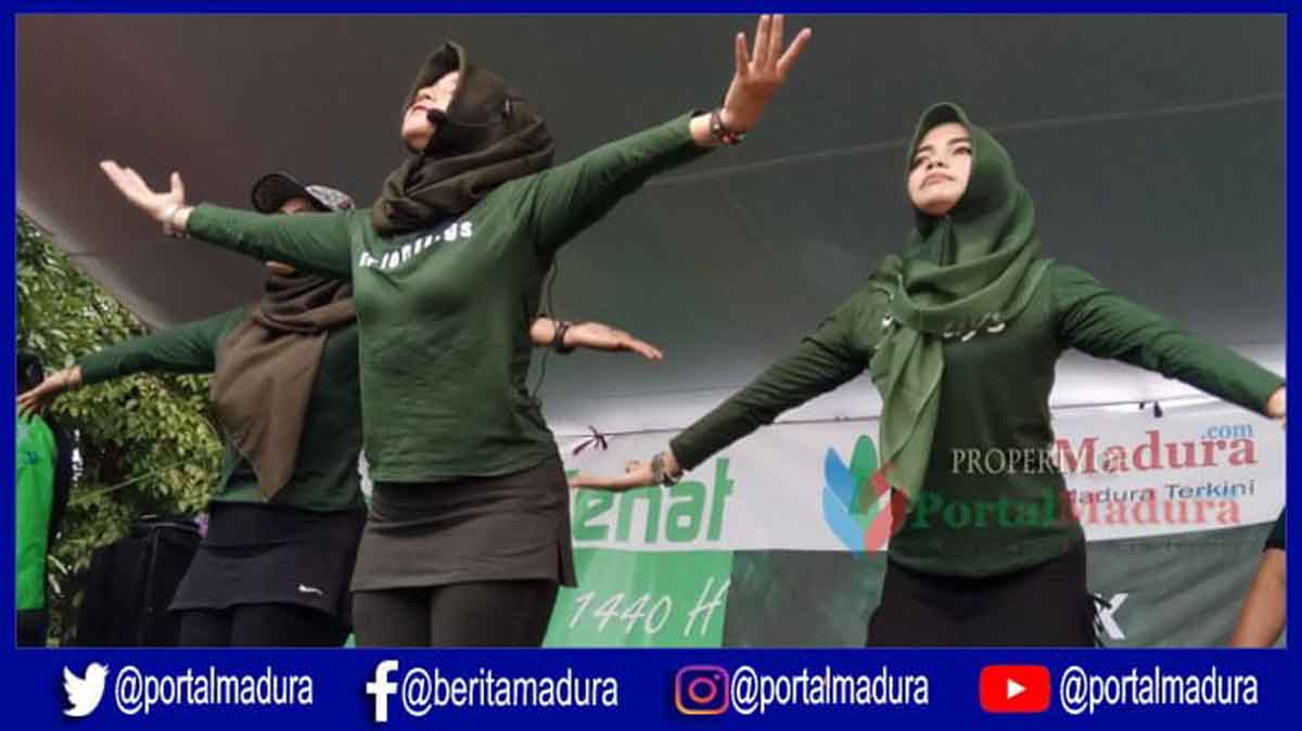 Diguyur Hujan, Senam Sehat Bersama Go-Jek Madura Tetap Meriah