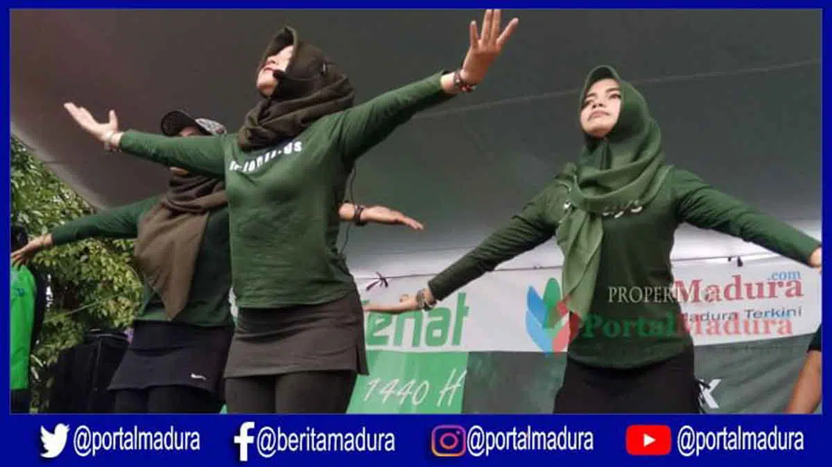 Diguyur Hujan, Senam Sehat Bersama Go-Jek Madura Tetap Meriah