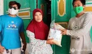 Hari Buruh di Tengah Badai Covid-19, AJP Bagi-bagi Sembako dan Masker