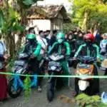 Mahasiswa UTM Distribusikan Santunan Anak Yatim Lewat Ojol