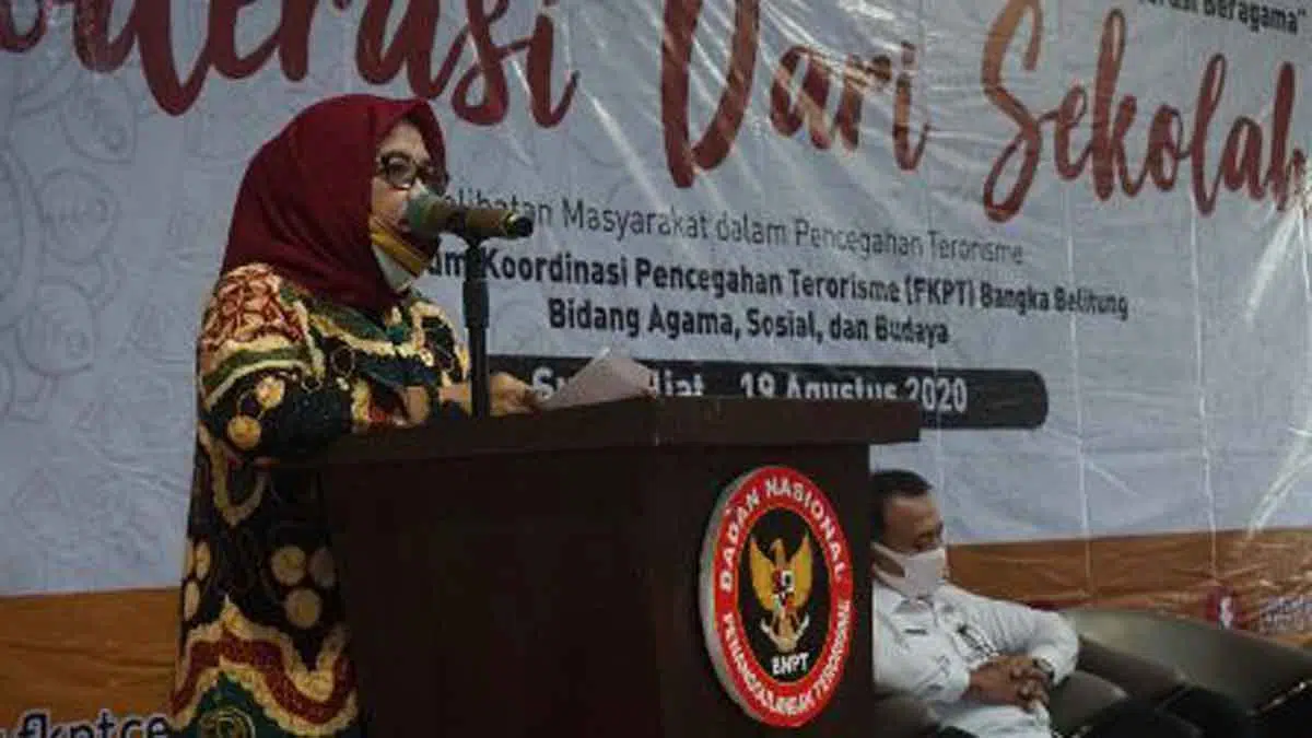 Dr. Hj. Andi Intang Dulung, M.H.I