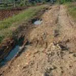 Jalan Poros Desa Montorna Rusak Parah