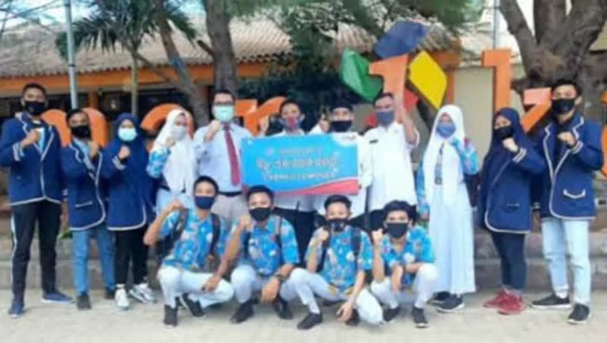 Hadiah Undian Simpeda Bank Jatim Cabang Sumenep Diantarkan Ke Rumah Nasabah - Portalmadura.com Suwarno (Istimewa)