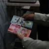 BI Rate Naik Lagi Jadi 5,75%, Rupiah Justru Keok 3 Hari Beruntun Lawan Dolar AS!