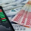 Rupiah Terus Melemah, Tembus Rp18.000 per Dolar AS: Ancaman Inflasi dan Tekanan Global Mengintai